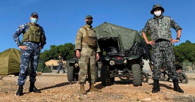 Wing Commander Stuart Wheal, left, United States Air Force Commander Lieutenant Colonel Christopher Denzer and Japan Air Self-Defense Force Commander Major Kenji Hoka during Exercise Cope North 21. Photo by Squadron Leader David Weekley.