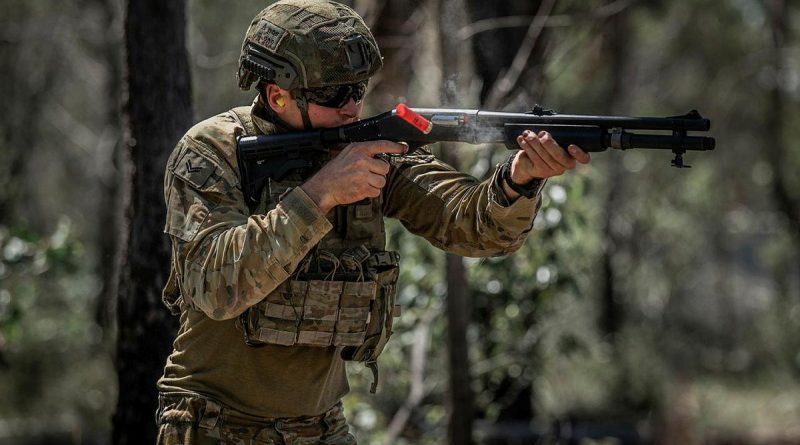 Corporal Shaun Abdilla, from the 6th Battalion, Royal Australian Regiment, fires a Remington 870 shotgun during a live-fire qualification shoot at the Greenbank Military Training Area, Brisbane. Photo by Private Jacob Hilton.