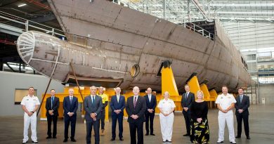 Attendees at the official opening of the OPV Enterprise Office in front of Pilbara, which is under construction at the Henderson Shipyard in Western Australia. Photo by Leading Seaman Ernesto Sanchez.