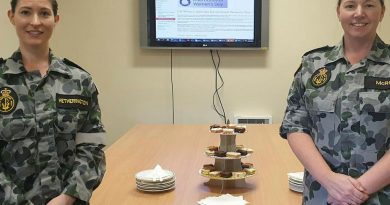 Warrant Officer Natasha McRoe, left, and Able Seaman Emily Hetherington celebrate International Women's Day on March 5 at Navy Headquarters Tasmania.