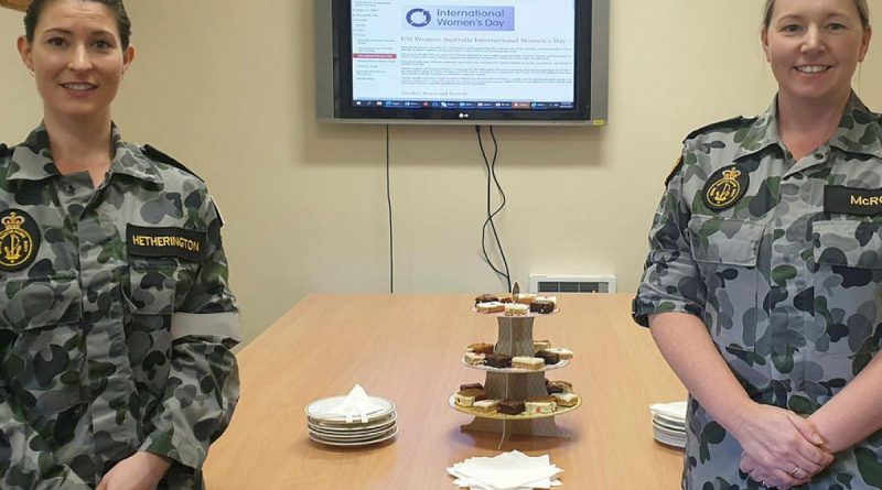 Warrant Officer Natasha McRoe, left, and Able Seaman Emily Hetherington celebrate International Women's Day on March 5 at Navy Headquarters Tasmania.