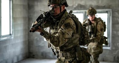 Private Keegan Newbery, front, from the 8th/9th Battalion, Royal Australian Regiment, conducts a room clearance during urban warfare tactical assault training at Gallipoli Barracks. Photo by Private Jacob Hilton.