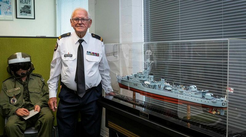Gerry Shepherd with the scale model of HMAS Bataan he presented to the Navy History Section at the Sea Power Centre, Canberra. Photo by Sergeant Sebastian Beurich.