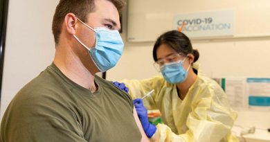 Trooper Jack Calcino receives a COVID-19 vaccine from registered nurse Daisy Hwang at the Royal Adelaide Hospital. Photo by Leading Aircraftman Stewart Gould.