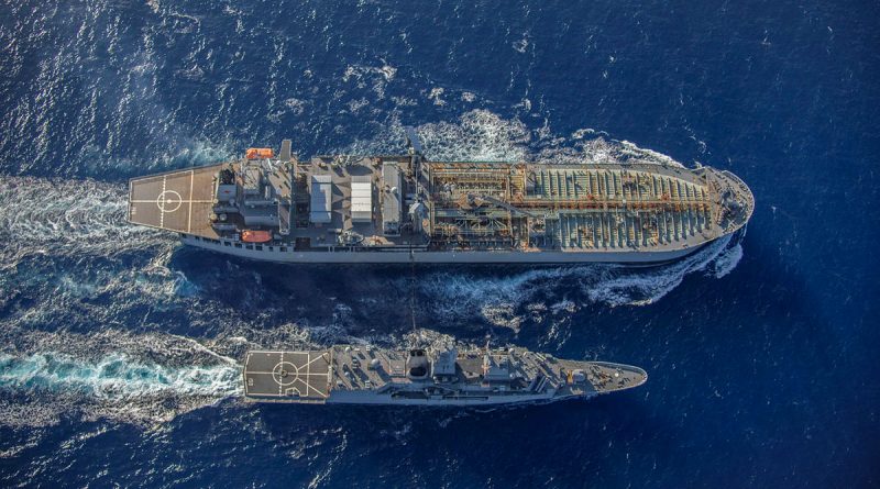 HMAS Anzac conducts a replenishment at sea with HMAS Sirius in the South China Sea. Photo by LSIS Thomas Sawtell.