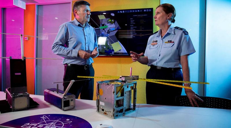 Head of Air Force Capability Air Vice Marshal Catherine Roberts speaks with Professor Russell Boyce about the M2 CubeSat at the University of New South Wales Canberra. Photo by Sergeant Oliver Carter.