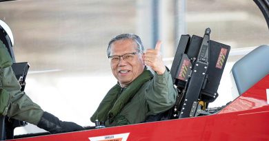 Governor of South Australia Hieu Van Le in a PC-21 aircraft after a flight during his visit to RAAF Edinburgh, South Australia. Photo by Leading Aircraftman Sam Price.