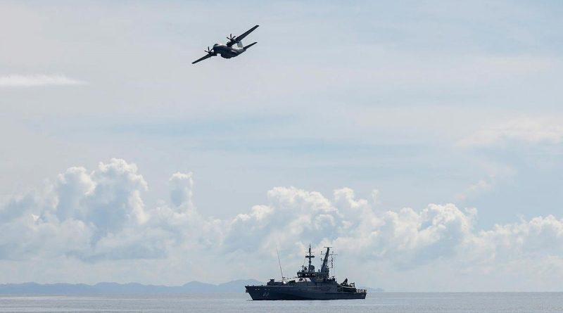 A Royal Australian Air Force C-27J Spartan flies over HMAS Maitland off the coast of Honiara, Solomon Islands, during a maritime surveillance patrol for illegal fishing activity on Operation Solania. Photo by FLTLT Peter Spearman.