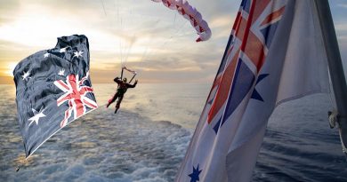 Composite image – An Army Red Beret drops from the sky with the Australian National Flag and the sun sets behind the Australian White Ensign on HMAS Armidale (II). ANF photo by Petty Officer Phil Cullinan. Ensign photo by Petty Officer Yuri Ramsey.