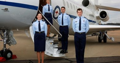 Crew attendants Leading Aircraftwoman Sophie Noonan, left, Leading Aircraftwoman Madeleine Braz, Leading Aircraftman Josh Lenard and Leading Aircraftman Jack Young on graduation day in front of the Dassault Falcon 7X. Photo by Sergeant Oliver Carter.