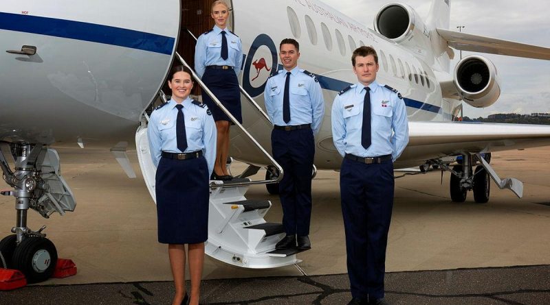 Crew attendants Leading Aircraftwoman Sophie Noonan, left, Leading Aircraftwoman Madeleine Braz, Leading Aircraftman Josh Lenard and Leading Aircraftman Jack Young on graduation day in front of the Dassault Falcon 7X. Photo by Sergeant Oliver Carter.