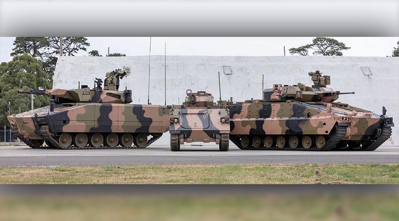 Rheinmetall's KF41 Lynx, left, and Hanwha's Redback, dwarf the M113 APC one of them will replace. Defence image.