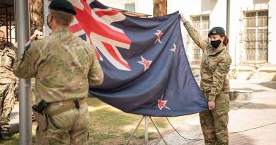 New Zealand Defence Force personnel lower the New Zealand National Flag in Kabul for the last time. NZDF photo.