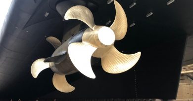 The completed pod installation includes a new four-blade propeller arrangement