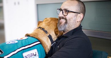 Ben Jones and his new psychiatric assistance dog Belle. Photo supplied.