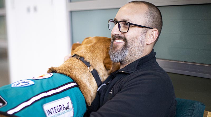 Ben Jones and his new psychiatric assistance dog Belle. Photo supplied.