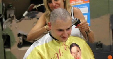 Trooper Darius Kaveh-Ahangari has his head shaved as part of Shave for a Cure.