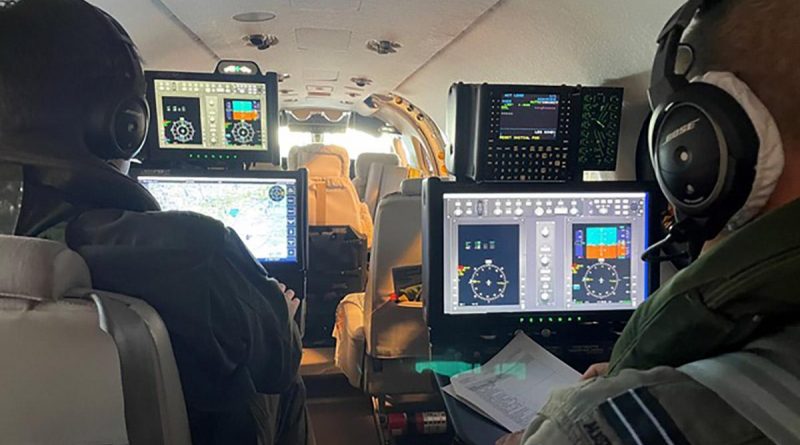 Air Mission Training School instructors Flight Lieutenants Sam de Boer, left, and Andrew Tyson conduct functional testing on the new Mission Airborne Training System. Story by Flight Lieutenant Julia Ravell. Photo by Squadron Leader Charles Tomlinson.