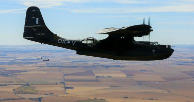 A24-362 OX-V Catalina takes to the skies near RAAF Base Edinburgh. In the background a Neptune and a AP-3C Orion. 3 generations of 11 Squadron aircraft. Photo by Corporal Craig Barrett.