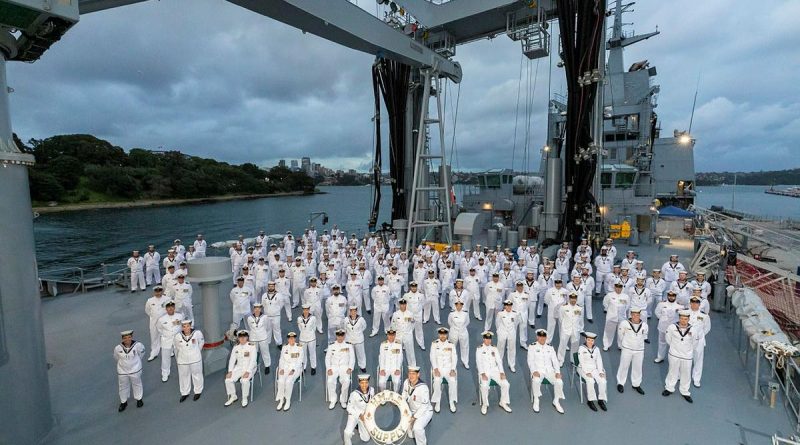 The commissioning crew of NUSHIP Supply stands on the deck while berthed alongside FBE on March 18. Photo by Able Seaman Daniel Goodman.