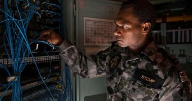 Able Seaman Communications and Information Systems Duncan Stemp conducts maintenance on HMAS Anzac’s Local Area Network. Photo by Leading Seaman Thomas Sawtell.