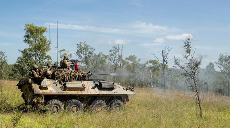 Soldiers from the 2nd Cavalry Regiment engage an enemy position with the Australian Light Armoured Vehicle’s 25mm M242 Bushmaster Chain Gun during a troop live-fire attack. Photo by Corporal Brodie Cross.