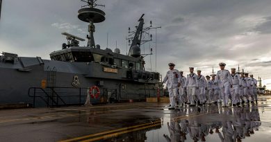 Commanding Officer HMAS Pirie Lieutenant Commander Sean Dalton leads the ship's company as they march off after the patrol boat’s decommissioning at HMAS Coonawarra in Darwin. Photo by Leading Seaman Shane Cameron.