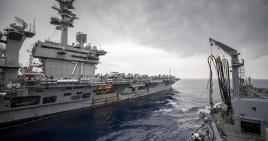 HMAS Sirius conducts a replenishment at sea with USS Theodore Roosevelt. Photo by Leading Seaman Thomas Sawtell.