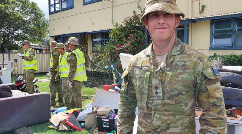 Lieutenant Kurt O’Neill, attached to the 2nd Combat Engineer Regiment, with his platoon help residents clean up after the flood at Laurieton.