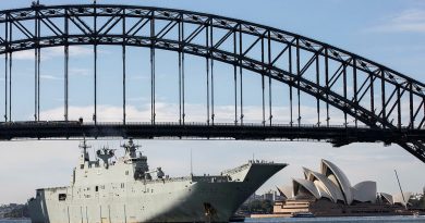 HMAS Adelaide sails under the Sydney Harbour Bridge to conduct a ship's pilotage exercise in Sydney, New South Wales. Story by Lieutenant Commander Christopher Thornton. Photo by Leading Seaman IS Tara Morrison.