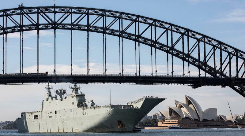 HMAS Adelaide sails under the Sydney Harbour Bridge to conduct a ship's pilotage exercise in Sydney, New South Wales. Story by Lieutenant Commander Christopher Thornton. Photo by Leading Seaman IS Tara Morrison.