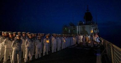 HMAS Anzac personnel conduct an Anzac Day ceremony in the South China Sea. Story by Lieutenant Geoff Long. Photo by Leading Seaman Thomas Sawtell.