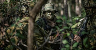 Sergeant Jone Naulivo, from the Republic of Fiji Military Forces, with soldiers from the 8th/9th Battalion, Royal Australian Regiment, during Exercise Coral Soldier. Story by Captain Taylor Lynch. Photo by Private Jacob Hilton.