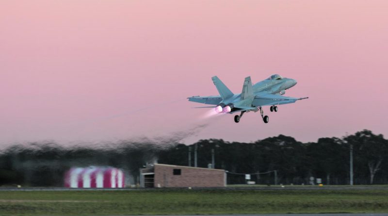 CAPTION: An Air Force F/A-18A Hornet takes off from RAAF Base Williamtown. Story by Flight Sergeant Josa Kohler. Photo by Sergeant David Gibbs