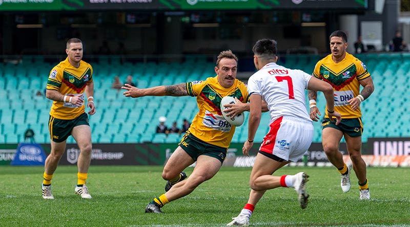 Private Dylan McGregor for ADFRL runs the ball at the Turkish defence during the 2021 ANZAC Day Rugby League clash at the Sydney Cricket Ground. Photo by Leading Seaman Nadav Harel.