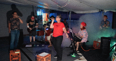 HMAS Anzac band, Hodr's Knorr, performs on the ship's flight deck during a logistics visit to in Sembawang, Singapore. Story by Lieutenant Geoff Long. Photo by Leading Seaman Thomas Sawtell.