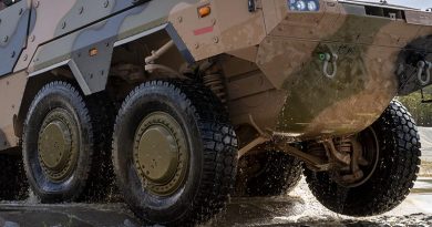 An Australian Army Boxer conducts a water crossing at Greenbank Training Area during a drivers' course. Cropped segment from a Corporal Nicole Dorrett photo.