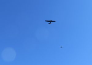 A Catailina and a UH-1H Iroquois fly together. Photo: Janet Hughes.