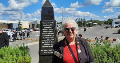 Former military nurse Colleen Crabb at the Nurses Memorial Plinth in Hervey Bay on ANZAC Day 2021.