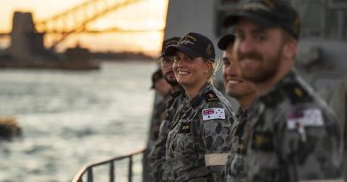 Able Seaman Claire Brown is all smiles as HMAS Parramatta departs Fleet Base East on Sydney Harbour for a two-month deployment to south-east and north-east Asia. Photo by Leading Seaman Jarrod Mulvihill.