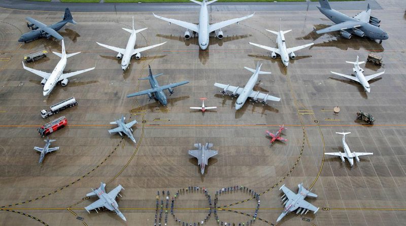 Air Force personnel representing all specialisations and musterings form the number 100 with all in-service RAAF aircraft and ground assets at RAAF Base Amberley, Queensland. Photo by Corporal Nicci Freeman.
