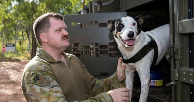 Explosive Detection Dog, Cheese, of the 1st Combat Engineer Regiment, and his handler Sapper Luke Saxton prepare for a search task during training at Kangaroo Flats Training Area, NT. Photo by Corporal Rodrigo Villablanca.