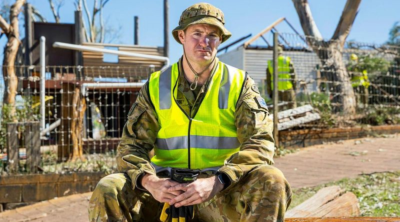 Private Scott Thompson at St Mary's Primary School, Northampton, WA, during the clean-up following Tropical Cyclone Seroja. Story by Captain Zoe Griffyn. Photo by Leading Seaman Kieren Whiteley.