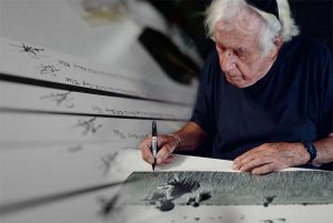 Legendary Vietnam photographer Tim Page signs some of his limited-edition prints to raise money for veteran charities.