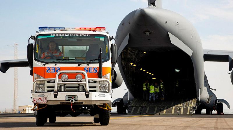 A Victorian State Emergency Service is driven off an Air Force C-17A Globemaster III aircraft, after being delivered from to Geraldton in Western Australia from Melbourne. Story by Eamon Hamilton. Photo by Leading Seaman Kieren Whiteley.