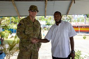 Captain Tim McPhee with Windua Church Elder Berne Kambai at the Lorlow youth convention. Photo by Corporal Olivia Cameron.