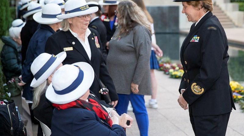 Warrant Officer of the Navy Deb Butterworth, right, speaks with Gaye Doolan, Heather Milward and Judith Rowe from the WRANS - Naval Women’s Association (ACT) at the Australian War Memorial. Story by Acting Sub-Lieutenant Jack Meadows. Photo by Petty Officer Bradley Darvill.