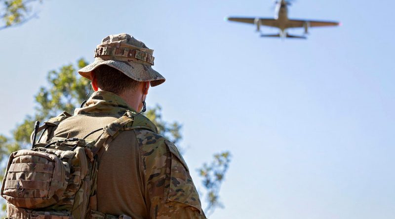 An Australian Army member, participating in the Number 67 Joint Terminal Attack Controller course, confirms target coordinates during Exercise Black Dagger 21-1 held out of Tindal in the Northern Territory. Story by Flight Lieutenant Georgina MacDonald. Photo by Corporal Nicci Freeman.