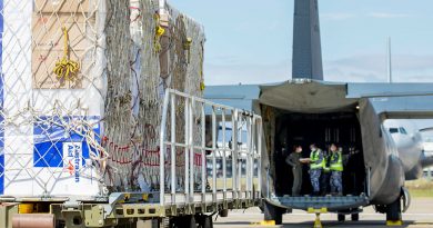 Air Movements Operators from No. 23 Squadron load pallets of AstraZeneca vaccines and COVID-19 medical supplies bound for Fiji onto a C-130J Hercules, at RAAF Base Amberley. Story by Eamon Hamilton. Photo by Leading AIrcraftwoman Emma Scwenke.