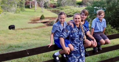 Leading Aircraftwoman Svitlana Pogrebnyak with her three children Christopher, centre, and twins Sophie and Matthew on their family property near RAAF Base Amberley in Queensland. Story by Flight Lieutenant Clarice Hurren.